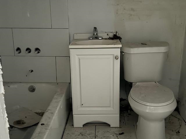177 Modder Avenue Memphis, TN 38109 - Photo 10 of 16 a bathroom with a toilet and a sink