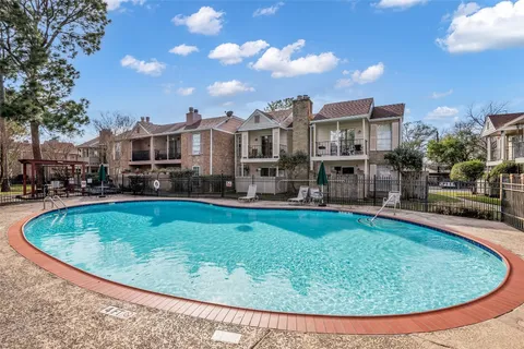 a view of outdoor space yard and swimming pool