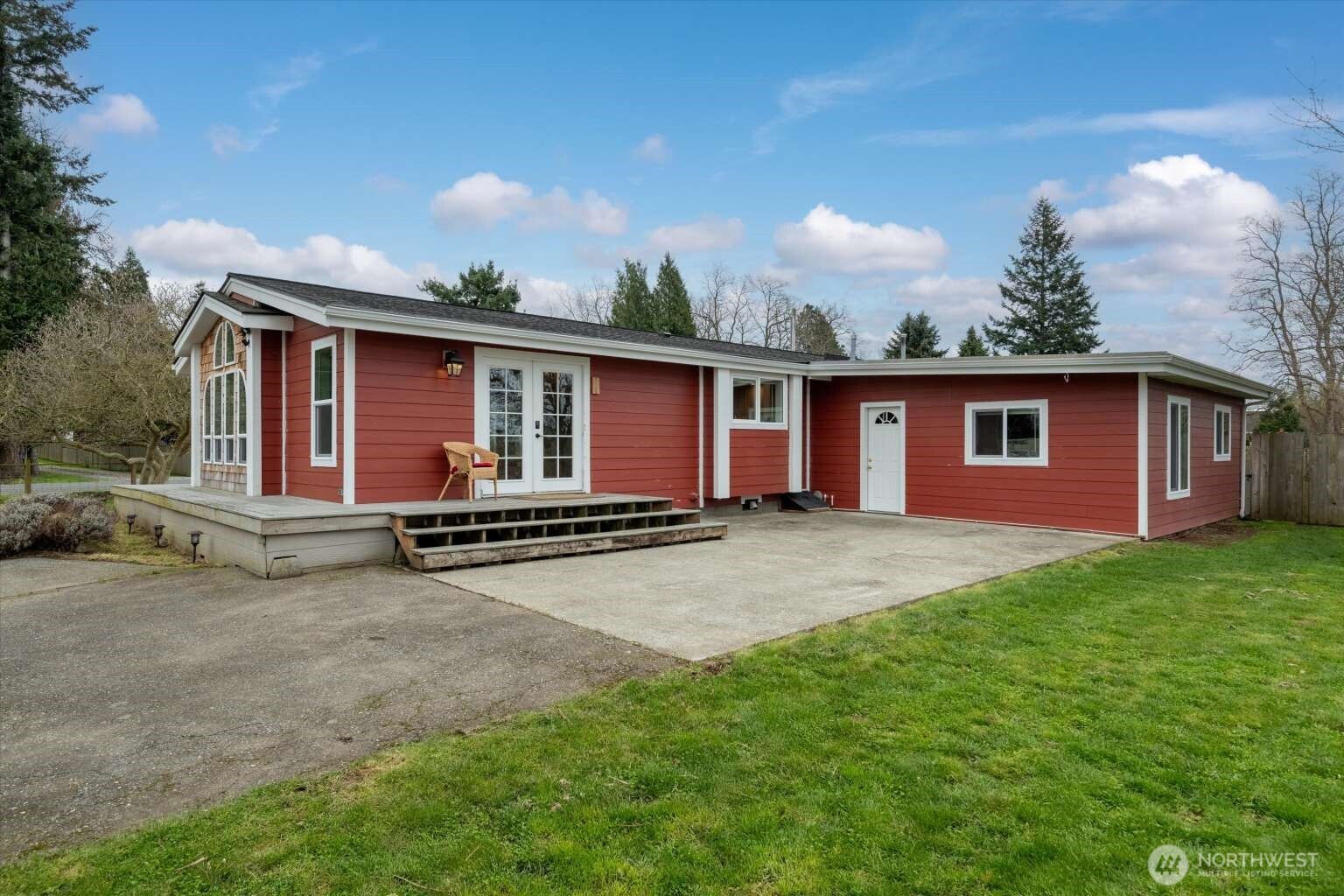 4241 Rural Avenue Bellingham, WA 98226 - Photo 4 of 40 a view of a house with backyard and a tree