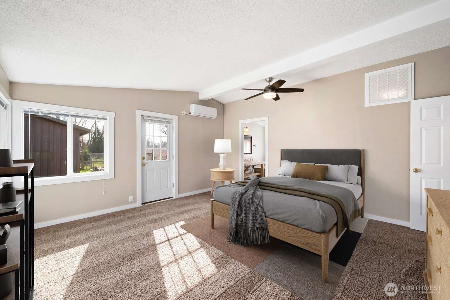4241 Rural Avenue Bellingham, WA 98226 - Photo 9 of 40 a bedroom with a bed cabinet and a window