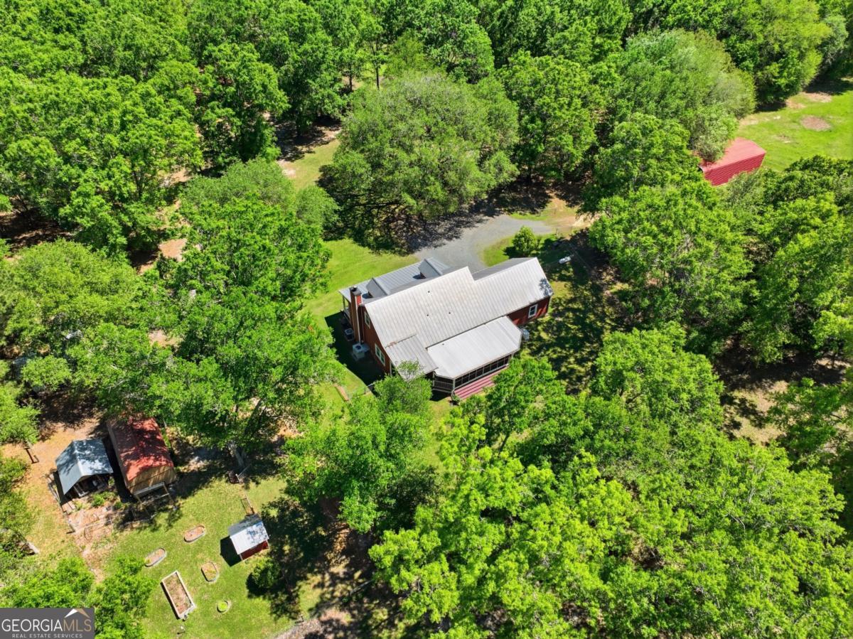 609 Morgan Street Albany, GA 31705 - Photo 46 of 74 an aerial view of a house with a yard and outdoor seating