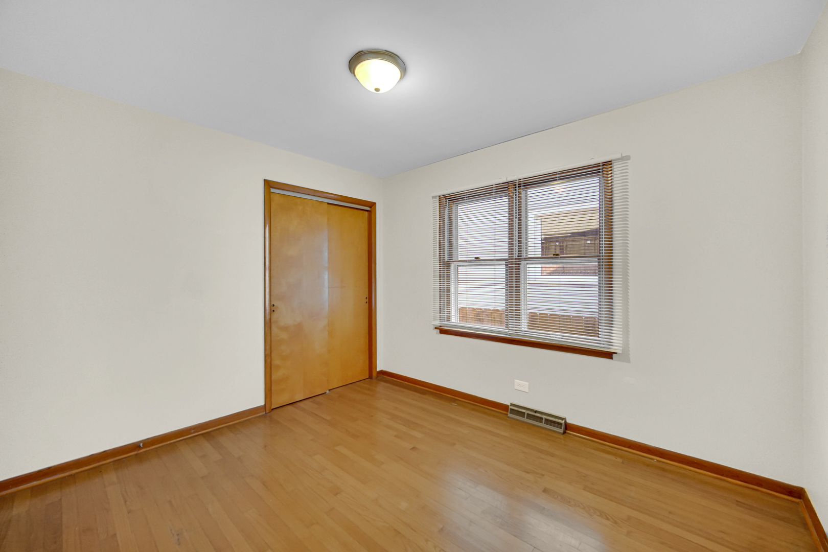 2621 Ridge Road Lansing, IL 60438 - Photo 11 of 20 an empty room with a window