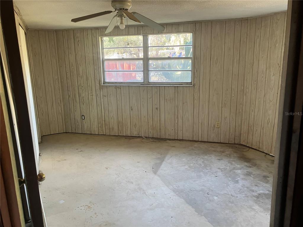 8428 Anay Court New Port Richey, FL 34653 - Photo 12 of 31 an empty room with a window