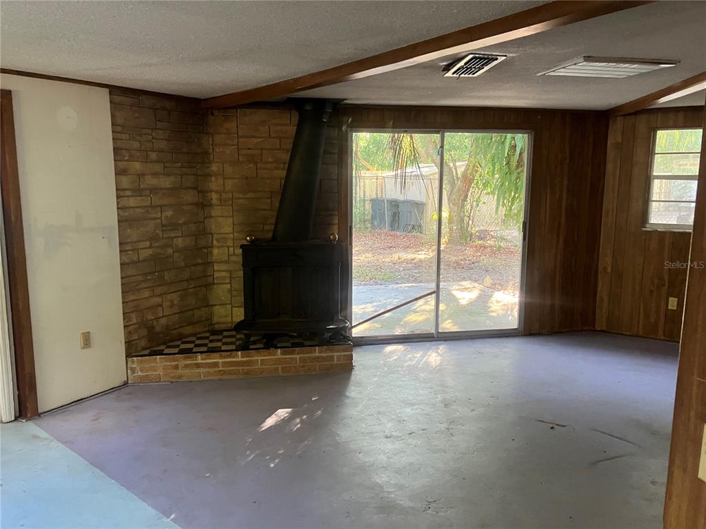 8428 Anay Court New Port Richey, FL 34653 - Photo 14 of 31 a view of an empty room with a window