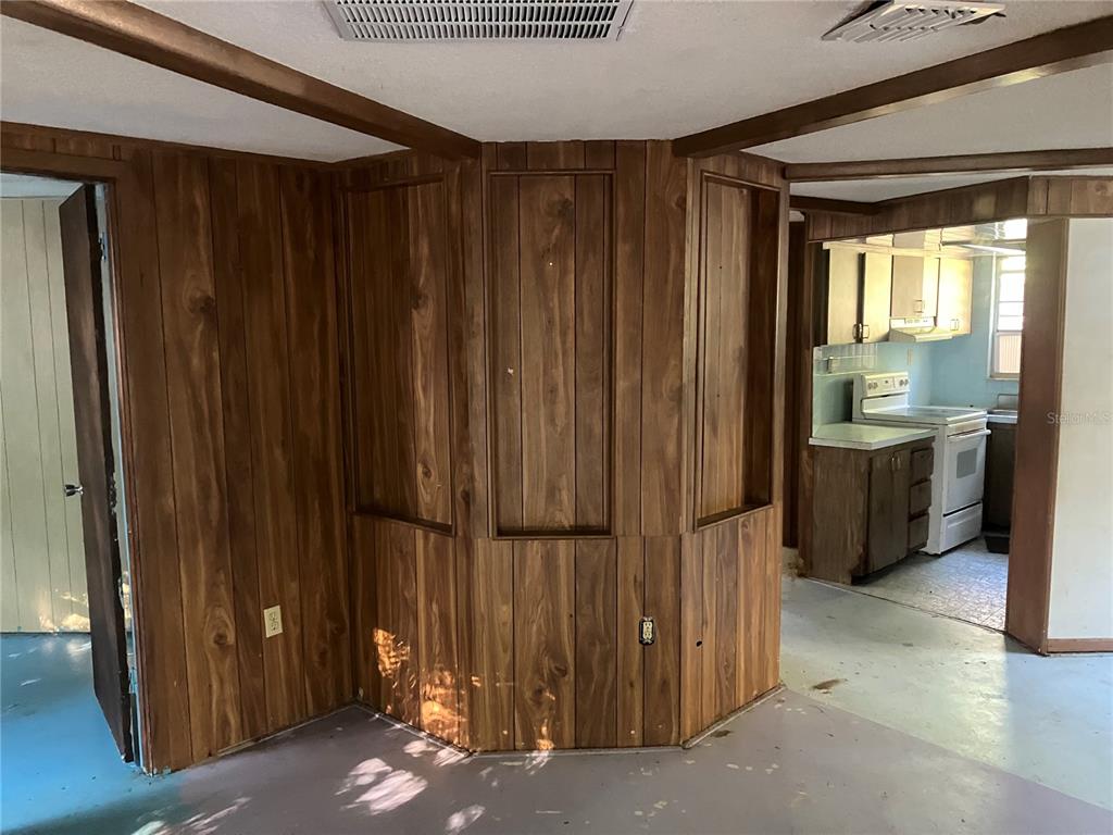 8428 Anay Court New Port Richey, FL 34653 - Photo 15 of 31 a view of a walk in closet