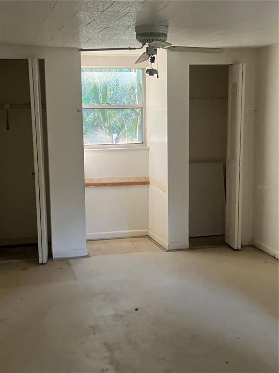 8428 Anay Court New Port Richey, FL 34653 - Photo 20 of 31 an empty room with windows