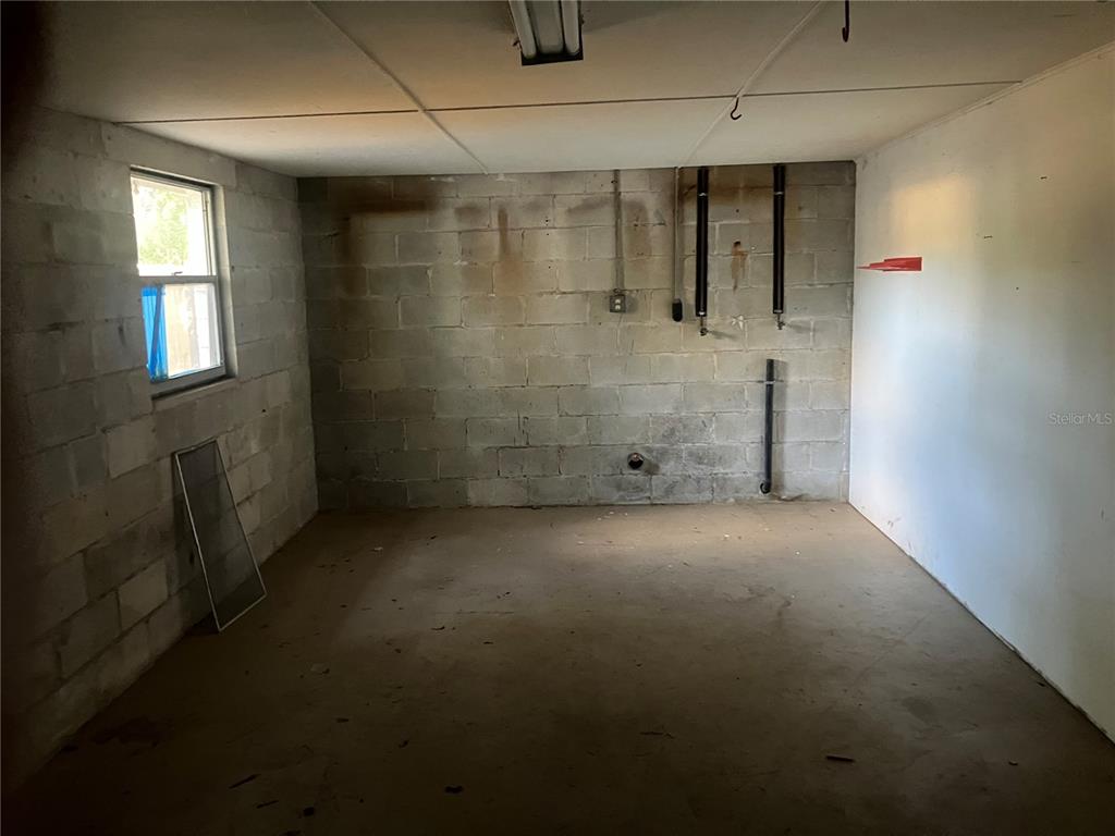 8428 Anay Court New Port Richey, FL 34653 - Photo 23 of 31 a view of a room with window