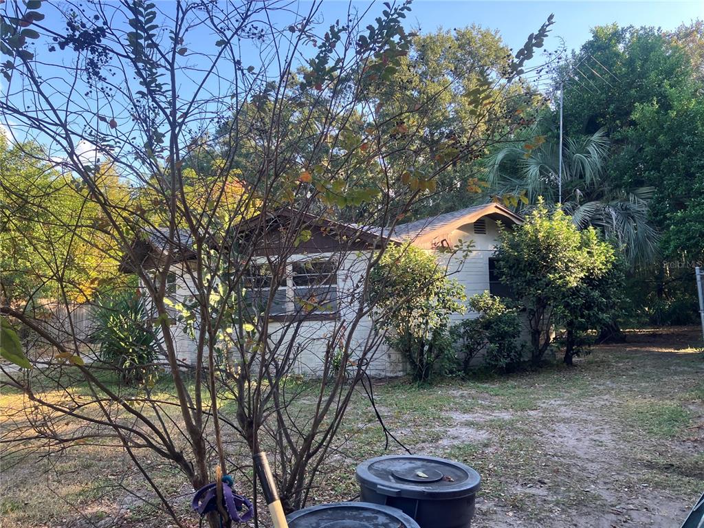 8428 Anay Court New Port Richey, FL 34653 - Photo 31 of 31 a view of a backyard of the house