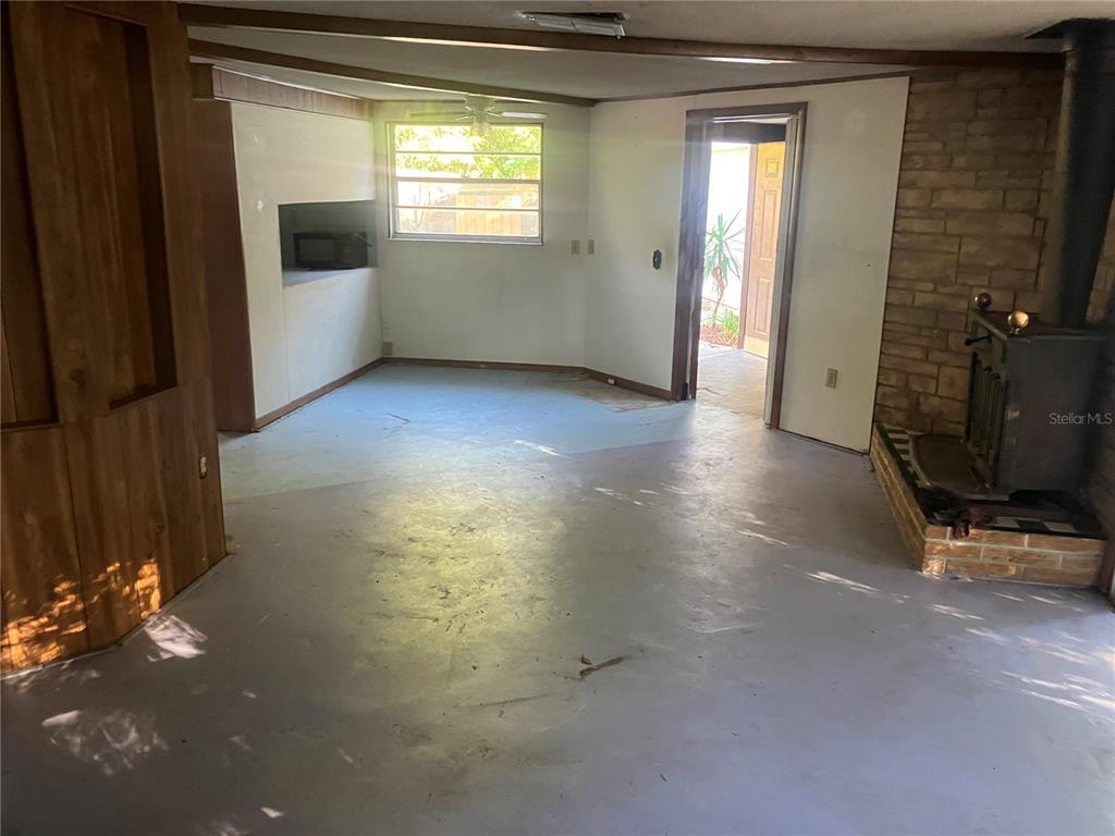 8428 Anay Court New Port Richey, FL 34653 - Photo 7 of 31 a view of an empty room with a window