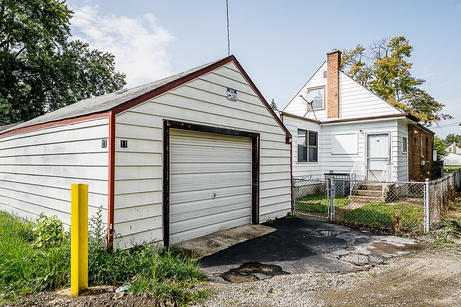 11 167th Street Calumet City, IL 60409 - Photo 20 of 20 a view of a house with backyard and sitting area