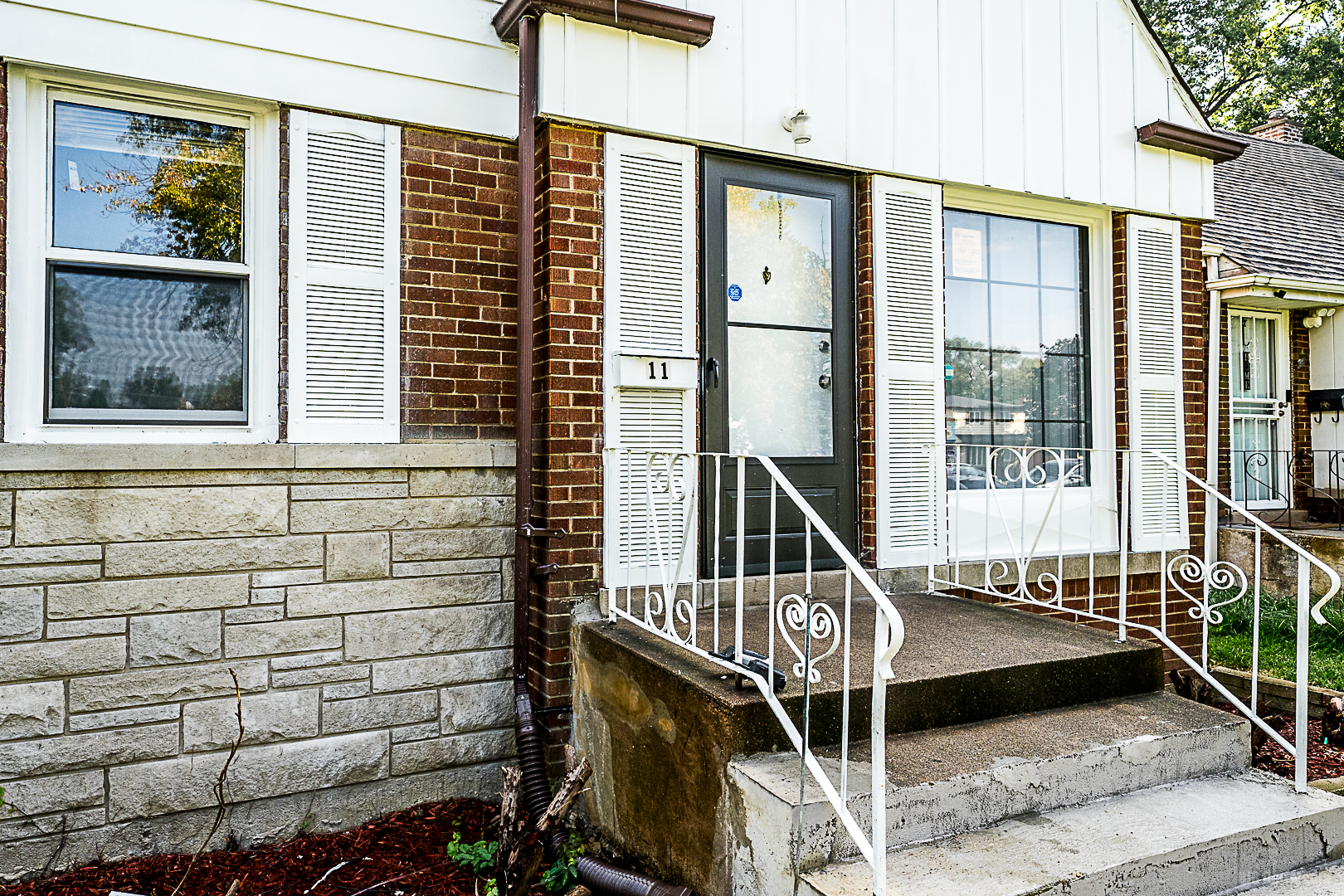 11 167th Street Calumet City, IL 60409 - Photo 2 of 20 a front view of a house with a window