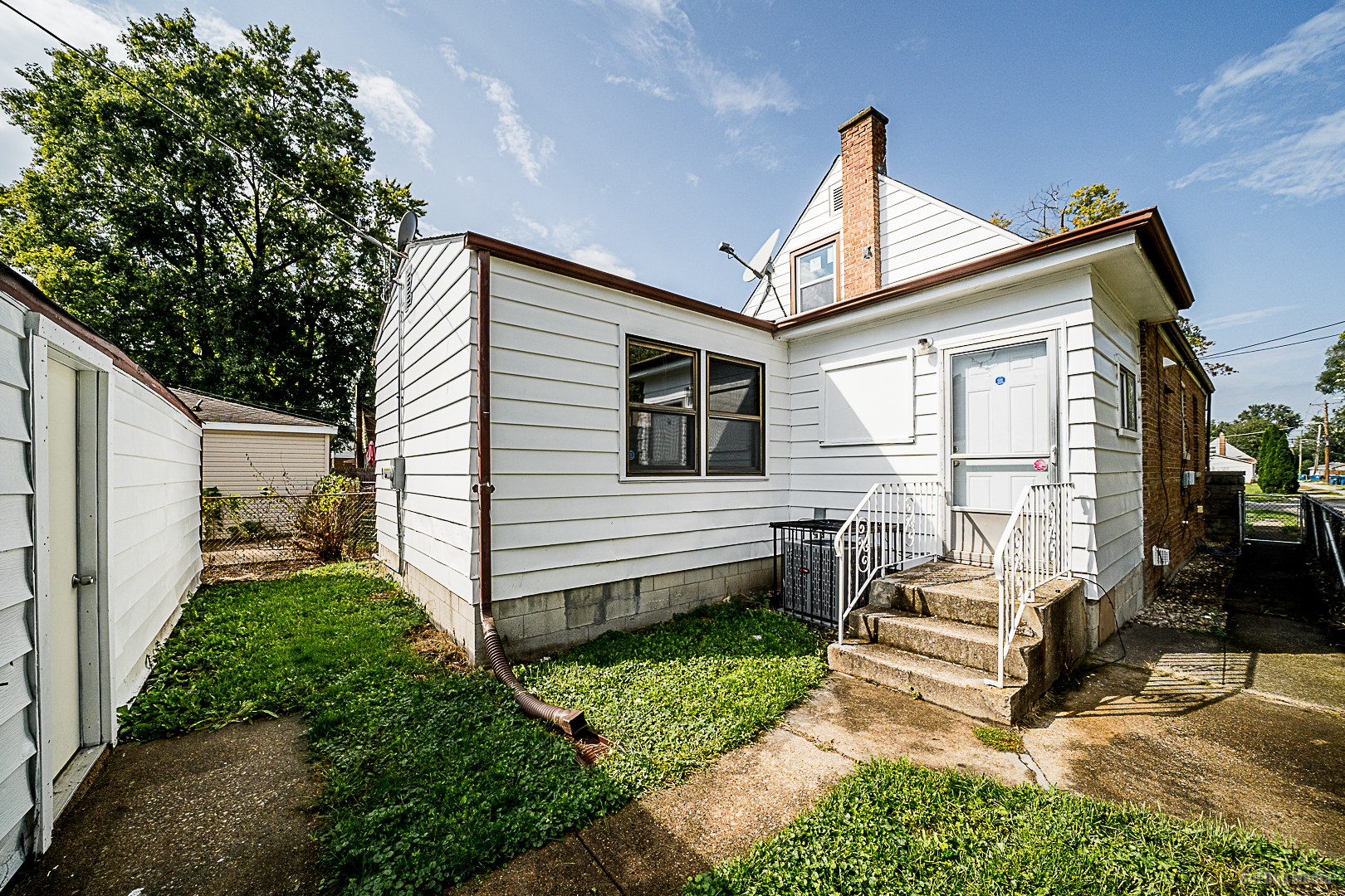 11 167th Street Calumet City, IL 60409 - Photo 3 of 20 a view of a house with backyard and sitting area