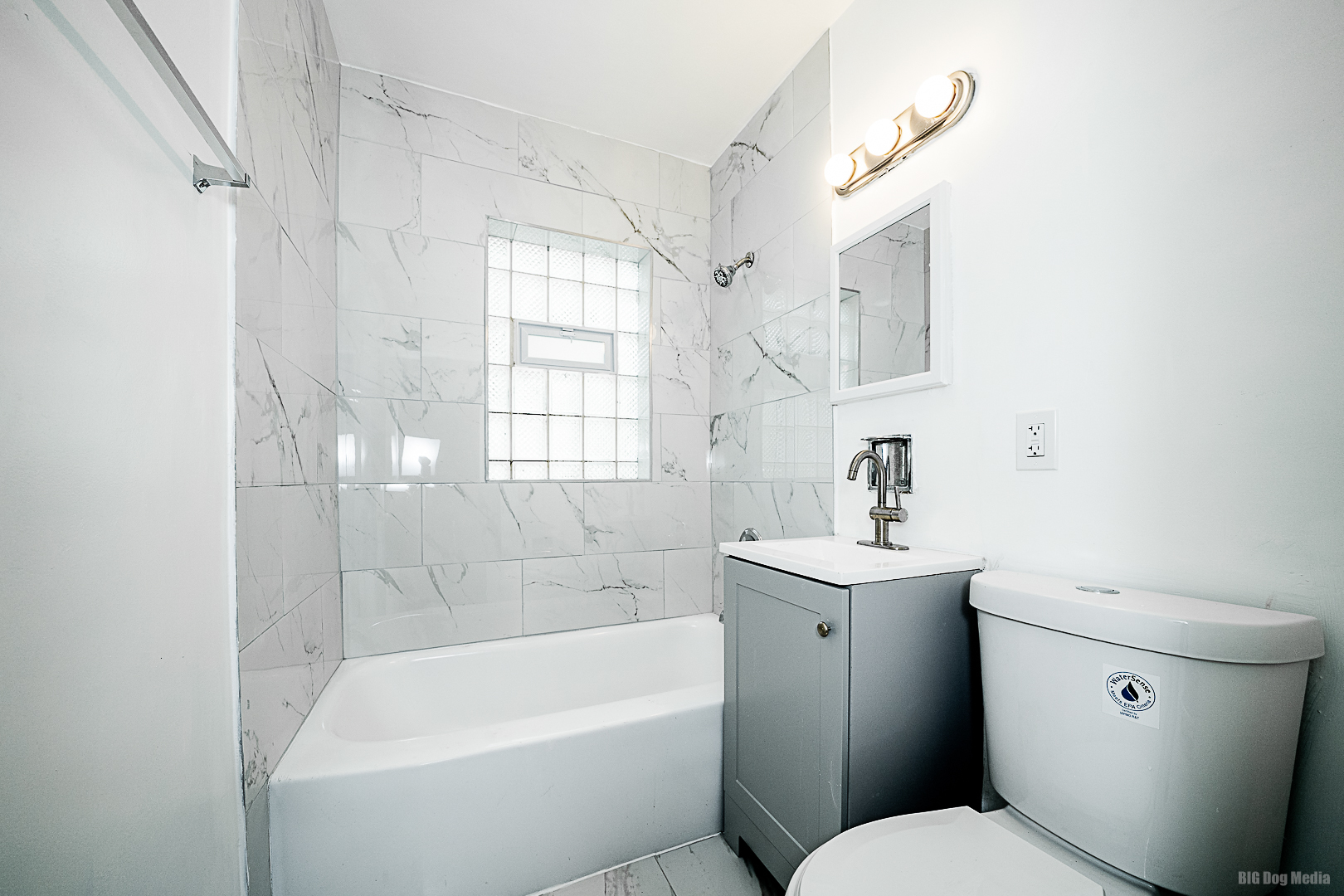 11 167th Street Calumet City, IL 60409 - Photo 6 of 20 a bathroom with a sink a toilet and shower