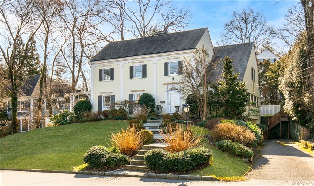 Welcome to this classic colonial in the heart of Scarsdale's Fox Meadow neighborhood.