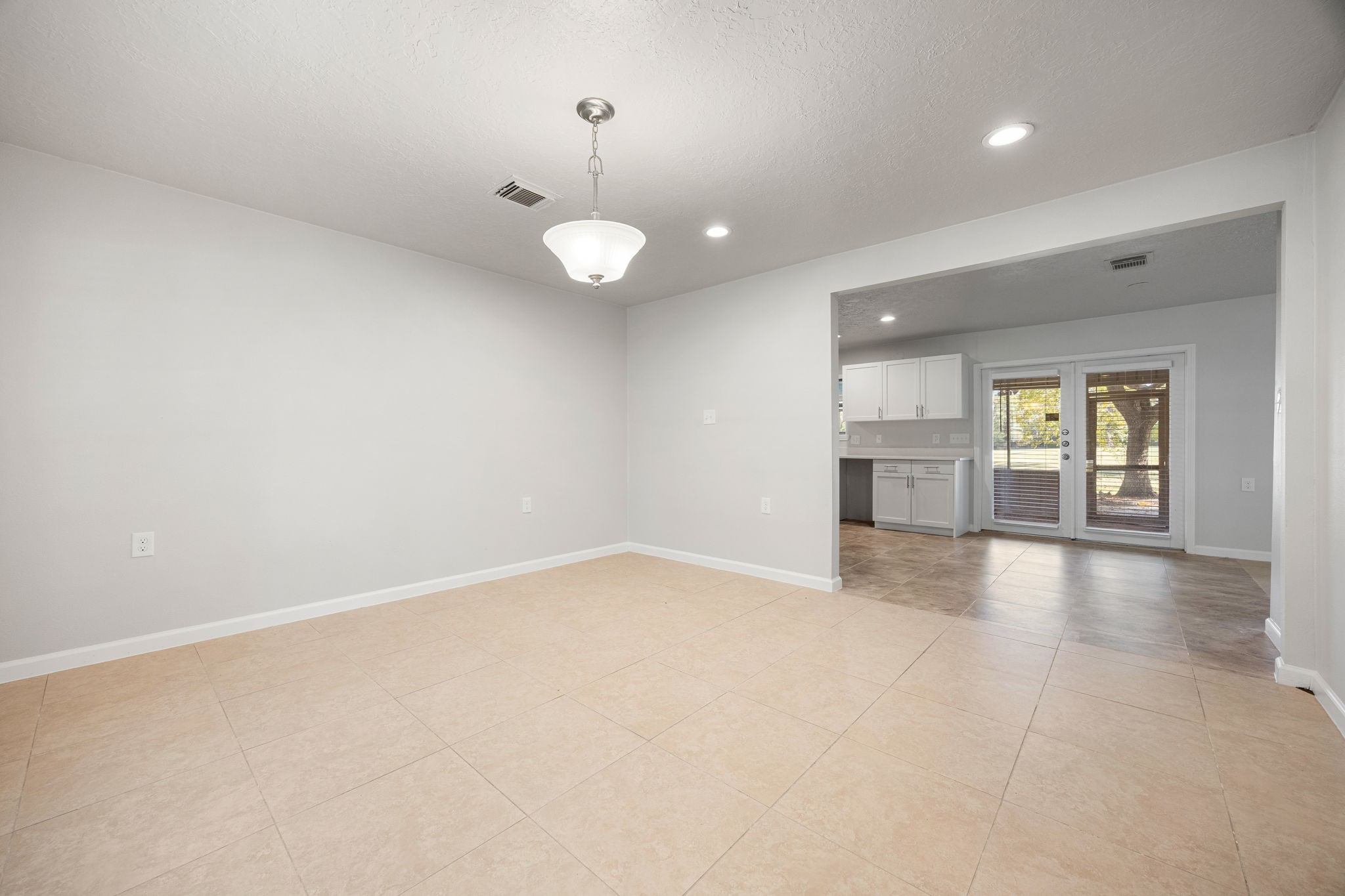 479 Brandon Road Conroe, TX 77302 - Photo 8 of 42 an empty room with a empty space and windows