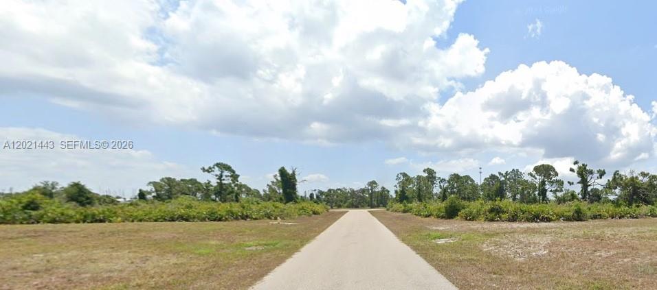 12 Trim Placida, FL 33946 - Photo 2 of 3 a view of a lake with a big yard