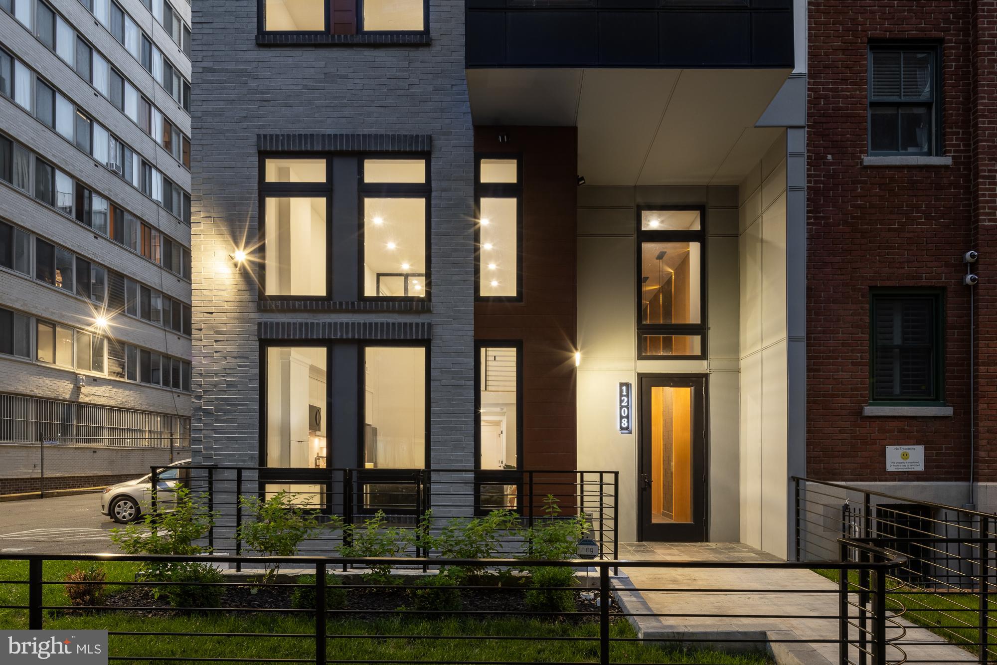 1208 M Street Northwest, Unit 61 Washington, DC 20005 - Photo 2 of 39 a front view of a building with street view