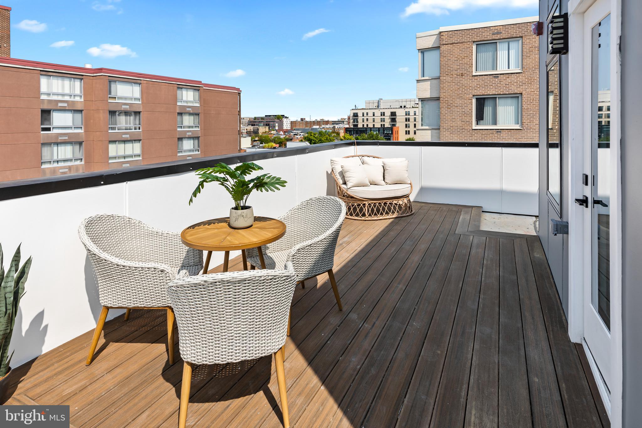1208 M Street Northwest, Unit 61 Washington, DC 20005 - Photo 27 of 39 a dining room with furniture and wooden floor