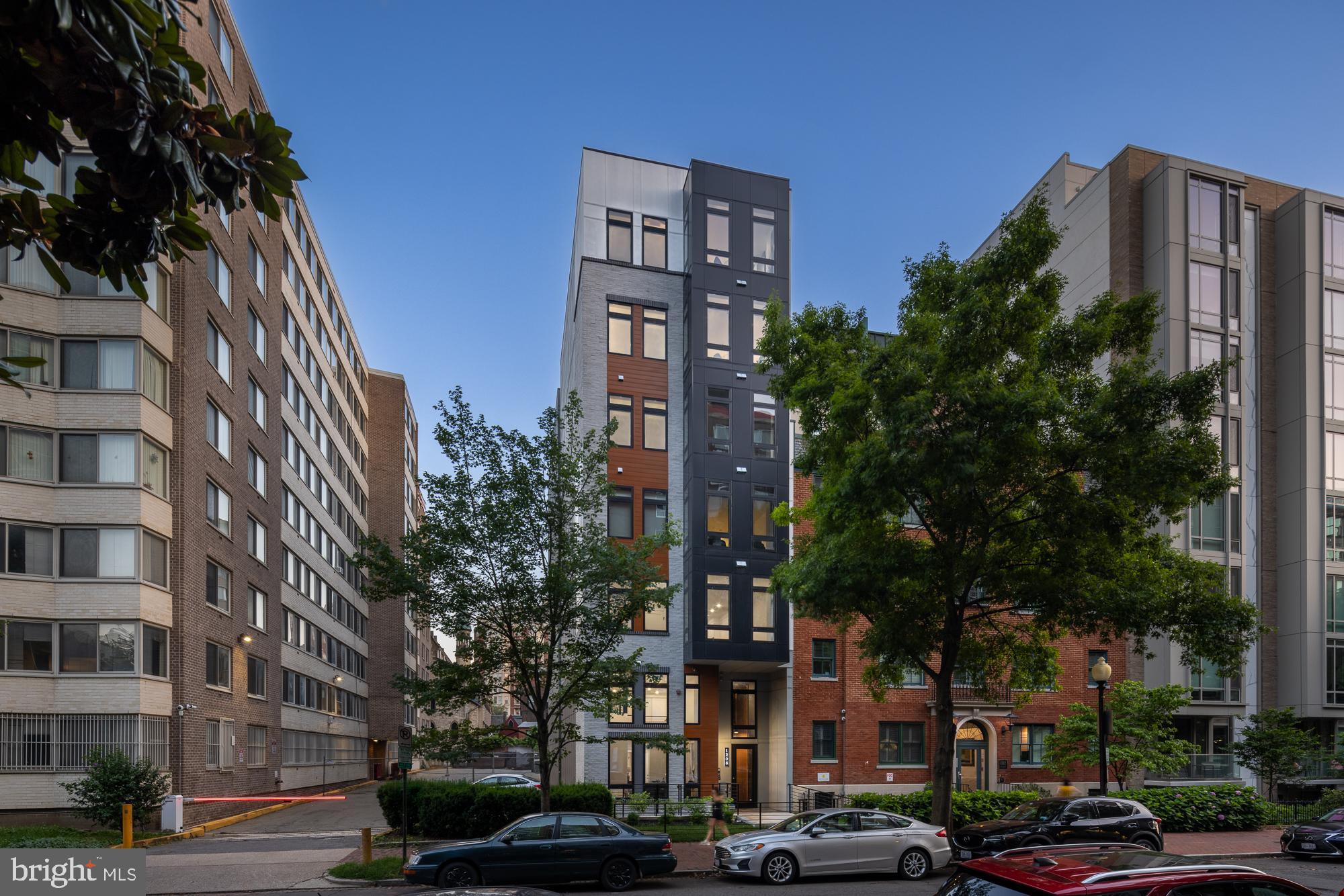 1208 M Street Northwest, Unit 61 Washington, DC 20005 - Photo 39 of 39 a city street lined with buildings and trees