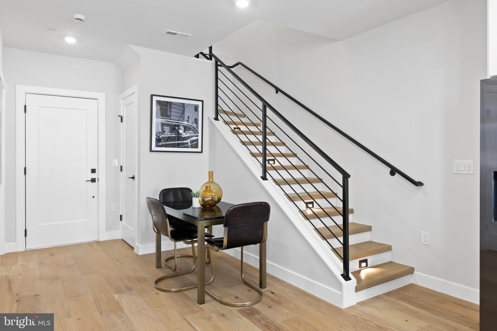 1208 M Street Northwest, Unit 61 Washington, DC 20005 - Photo 7 of 39 a view of entryway and hall with wooden floor