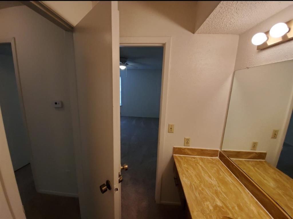 883 Waterfall Way Richardson, TX 75080 - Photo 18 of 26 a bathroom with a sink