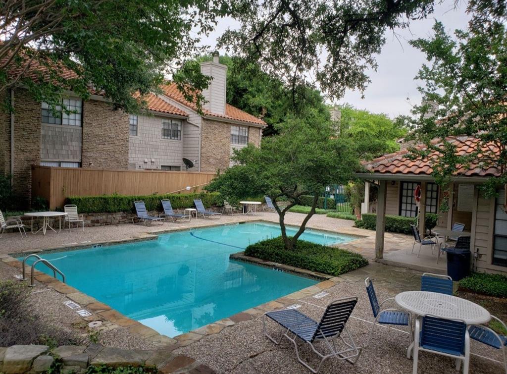 883 Waterfall Way Richardson, TX 75080 - Photo 24 of 26 a front view of a house with garden