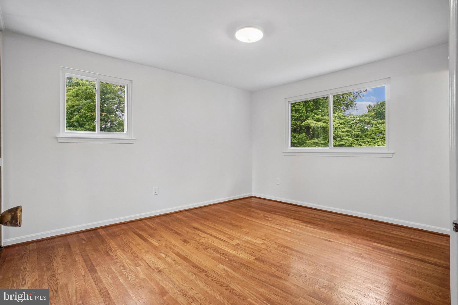 8933 Burke Lake Road Springfield, VA 22151 - Photo 25 of 47 Hardwood Floors in Primary Bedroom