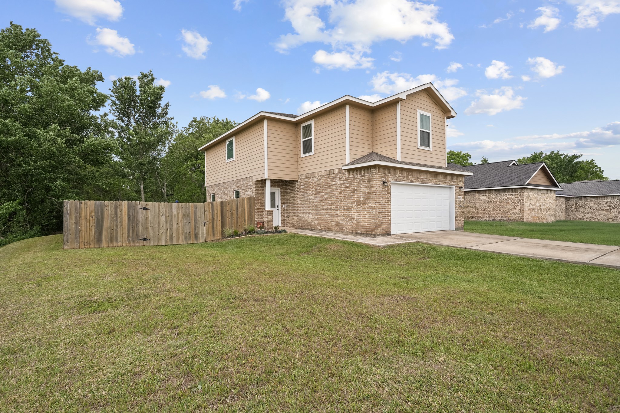 6101 Fox Ridge Drive Angleton, TX 77515 - Photo 2 of 30 a view of a house with a yard