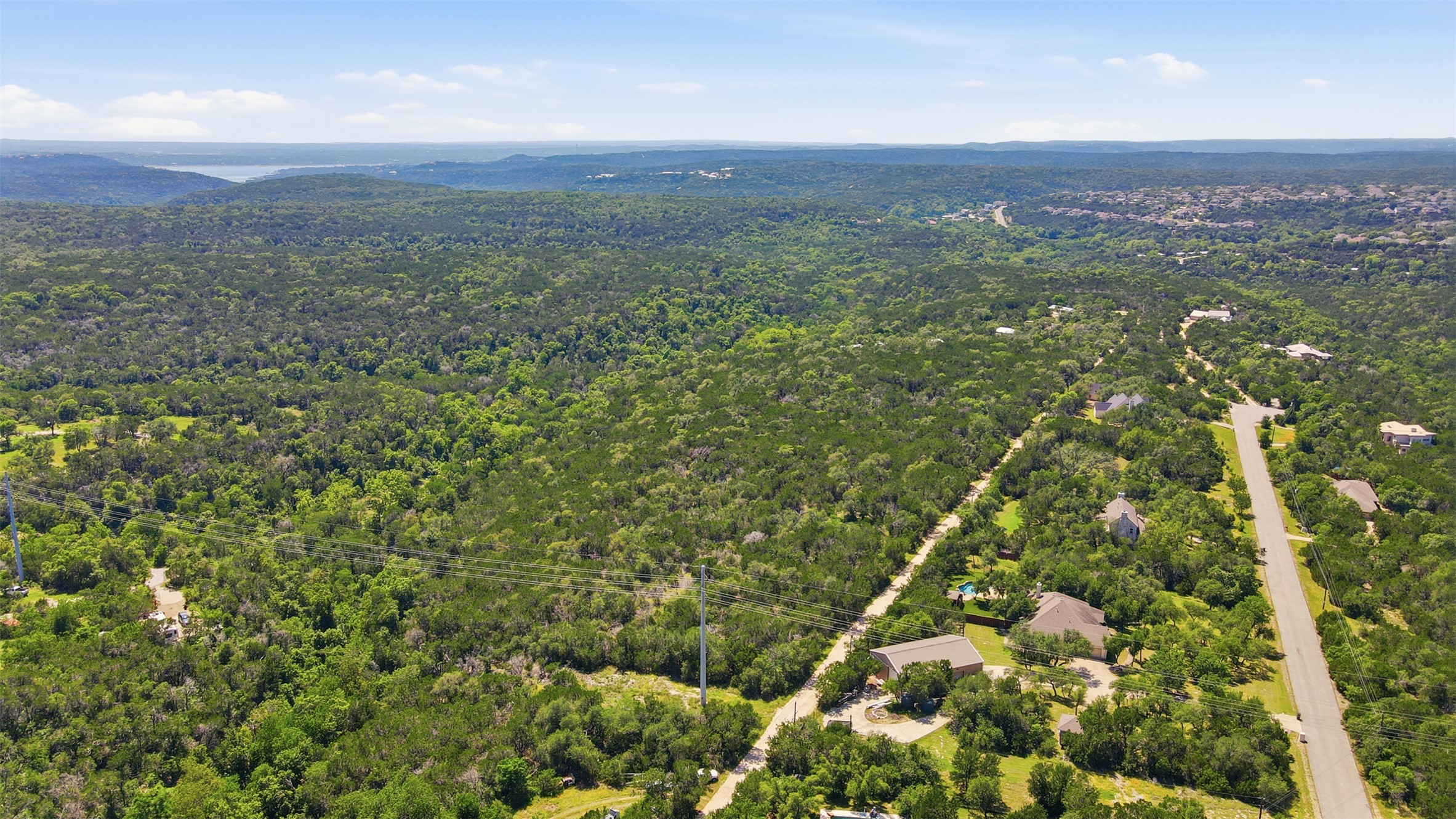 0 North Ranch Road 620 Road Austin, TX 78726 - Photo 16 of 20 a view of a city with lush green forest