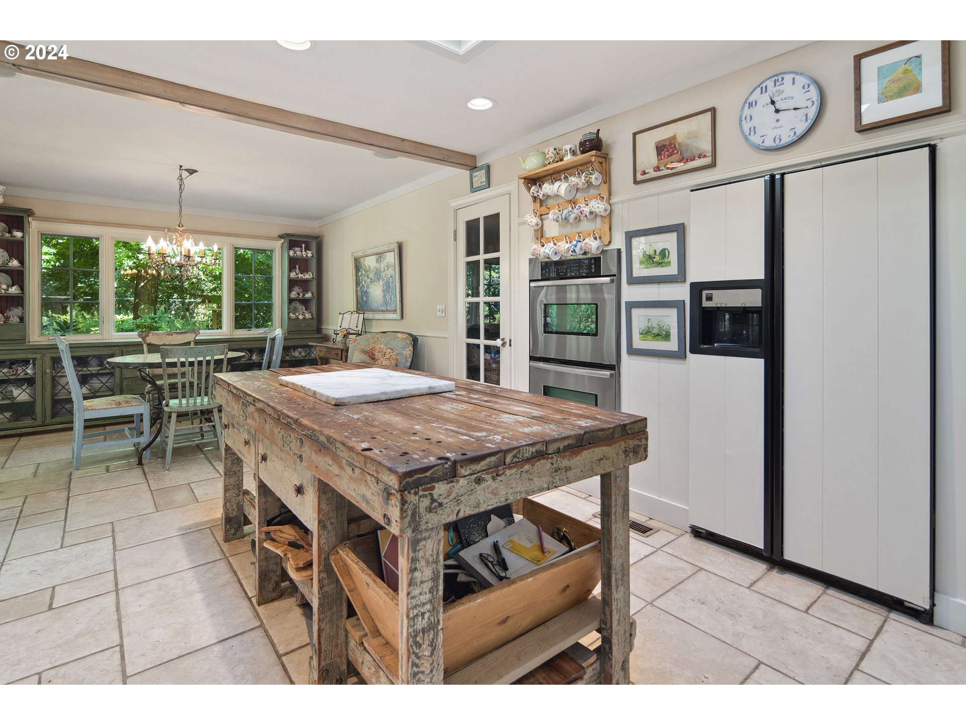 21545 Southwest Johnson Road West Linn, OR 97068 - Photo 11 of 43 a open kitchen with stainless steel appliances granite countertop a stove refrigerator and cabinets