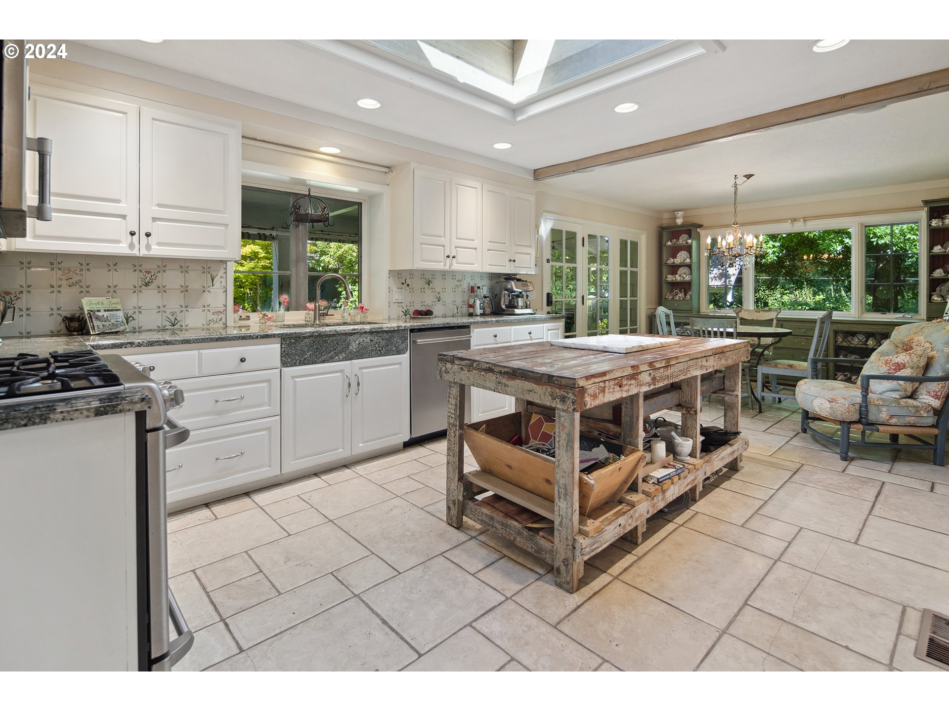 21545 Southwest Johnson Road West Linn, OR 97068 - Photo 12 of 43 a large white kitchen with cabinets and a stove