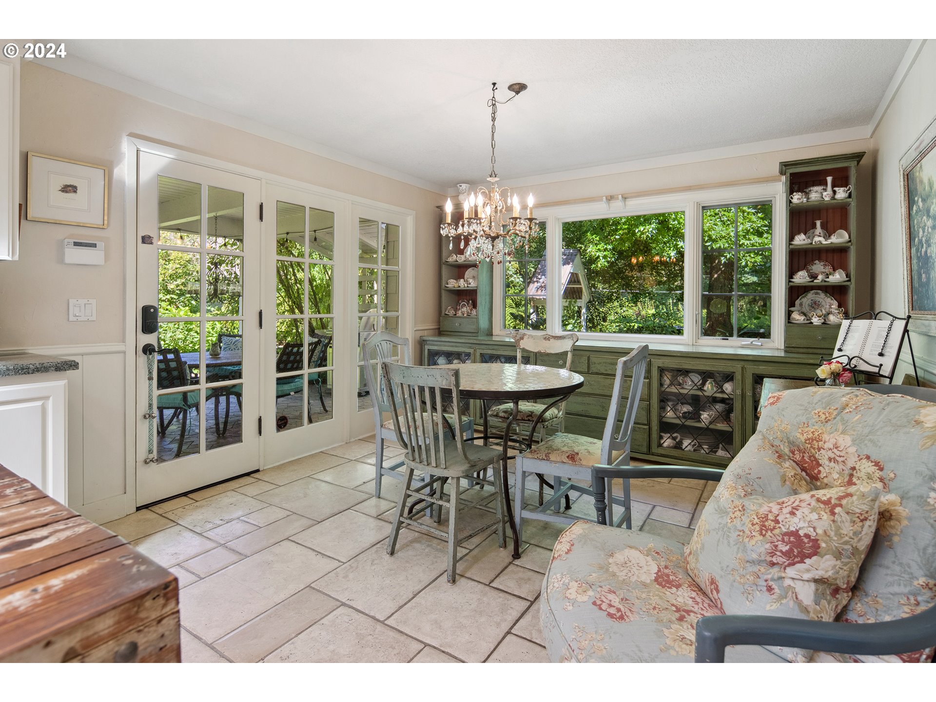 21545 Southwest Johnson Road West Linn, OR 97068 - Photo 13 of 43 a dining room with furniture a chandelier and a rug