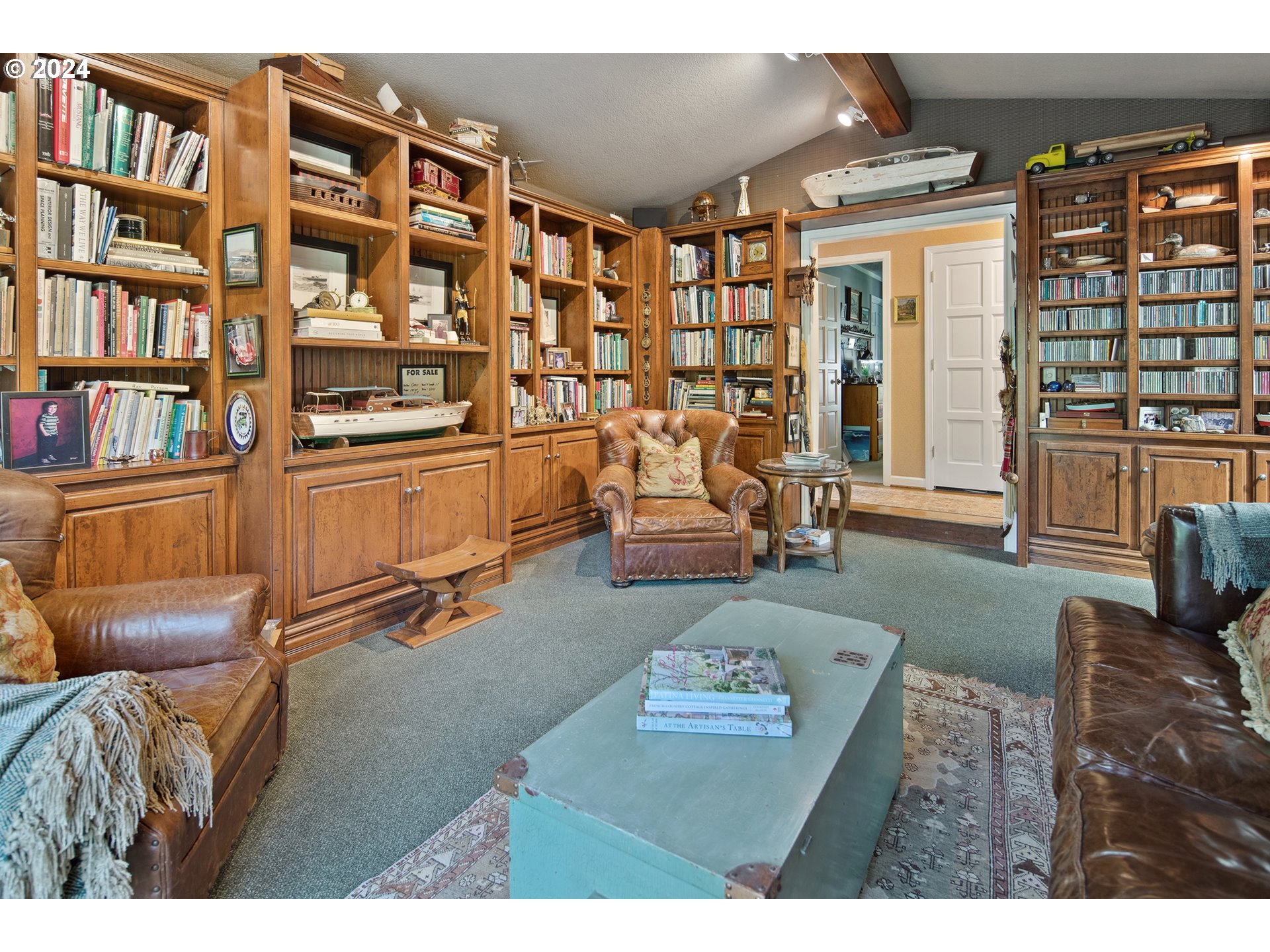 21545 Southwest Johnson Road West Linn, OR 97068 - Photo 14 of 43 a living room with furniture and a book shelf