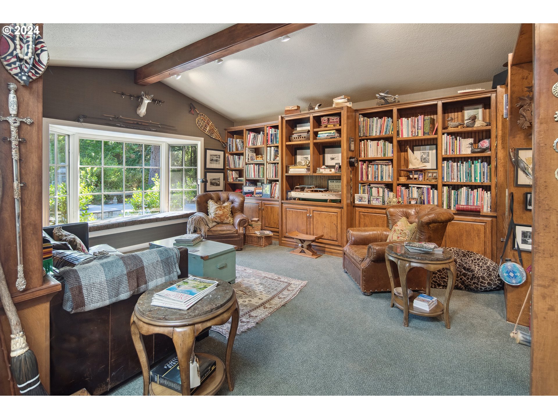 21545 Southwest Johnson Road West Linn, OR 97068 - Photo 15 of 43 a living room with furniture and a large window