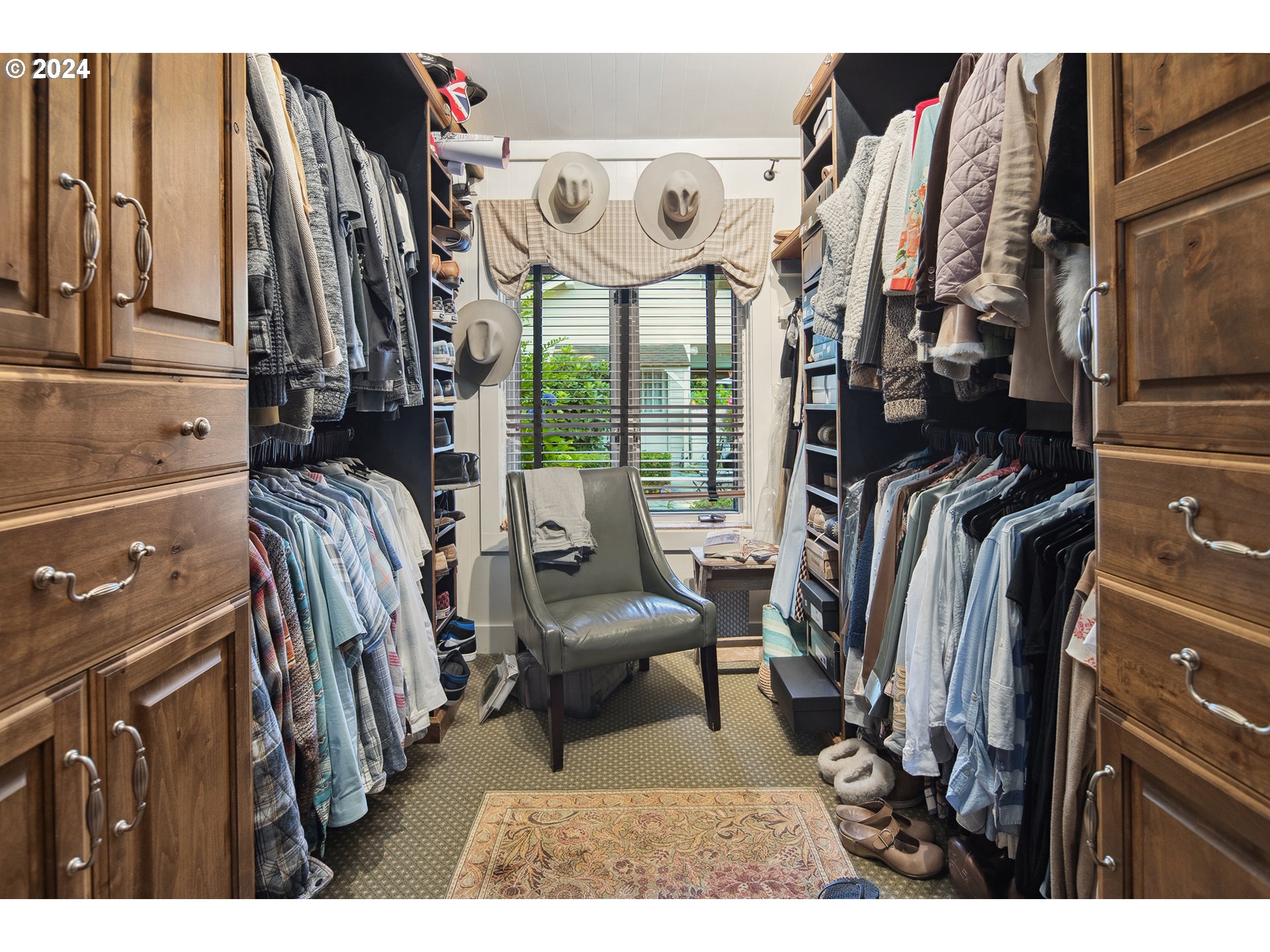 21545 Southwest Johnson Road West Linn, OR 97068 - Photo 17 of 43 a view of walk in closet with clothes and shoes