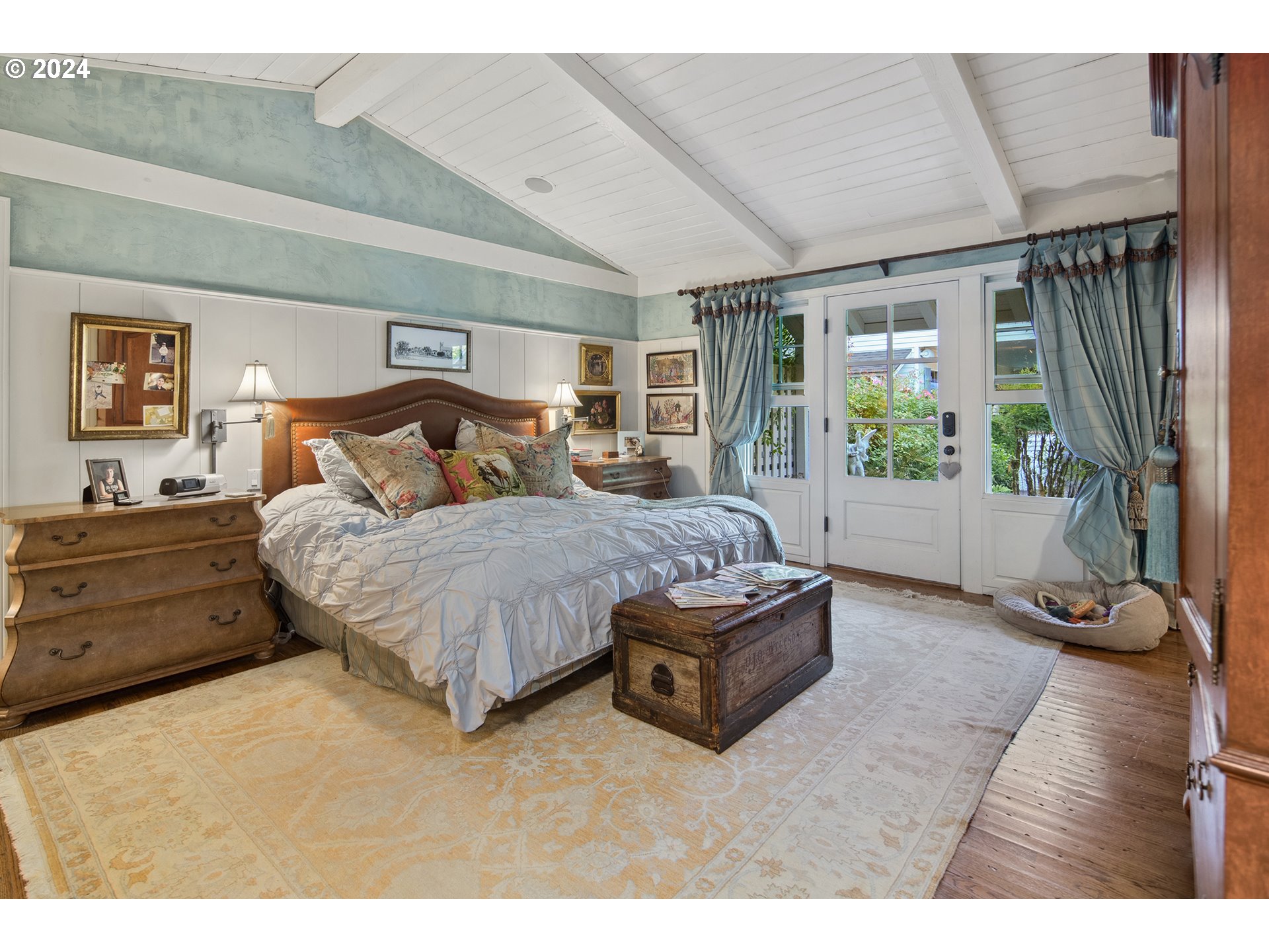 21545 Southwest Johnson Road West Linn, OR 97068 - Photo 19 of 43 a spacious bedroom with a bed window and a couch