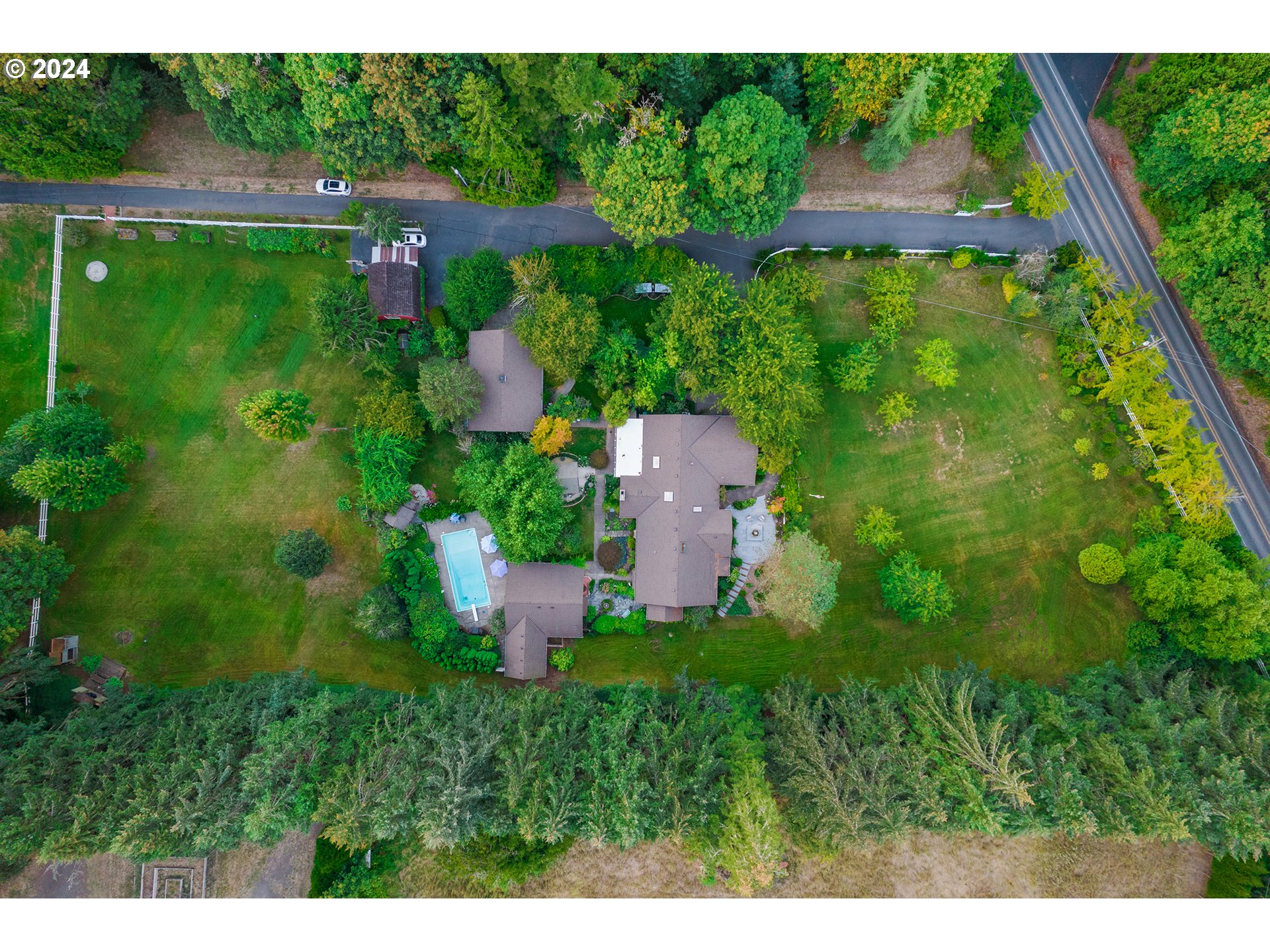 21545 Southwest Johnson Road West Linn, OR 97068 - Photo 2 of 43 a view of a garden with an outdoor space