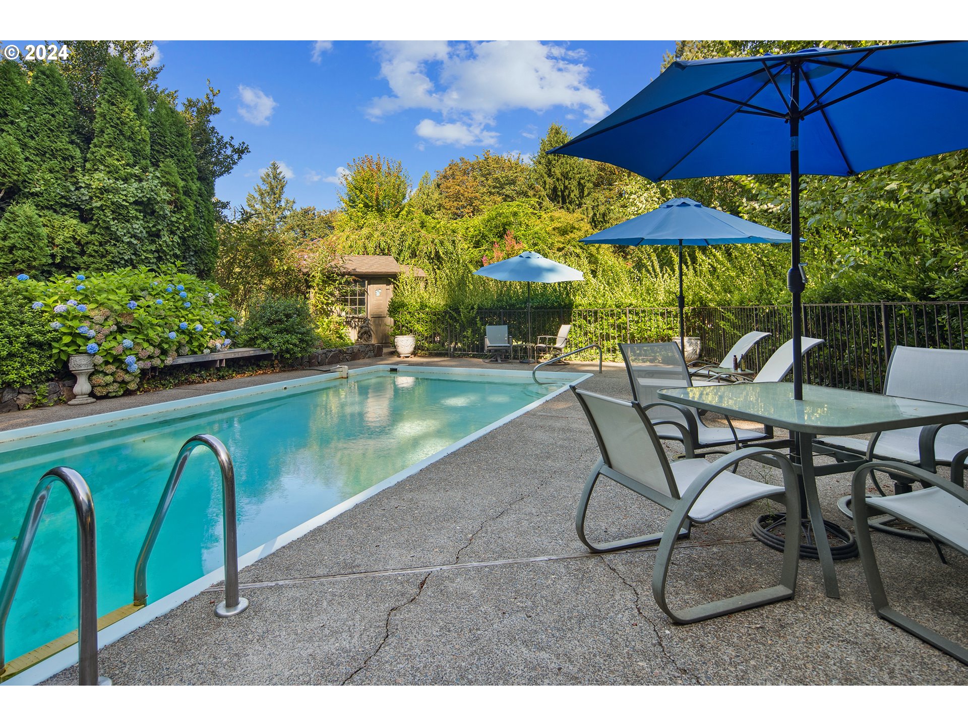 21545 Southwest Johnson Road West Linn, OR 97068 - Photo 31 of 43 a view of swimming pool with outdoor seating