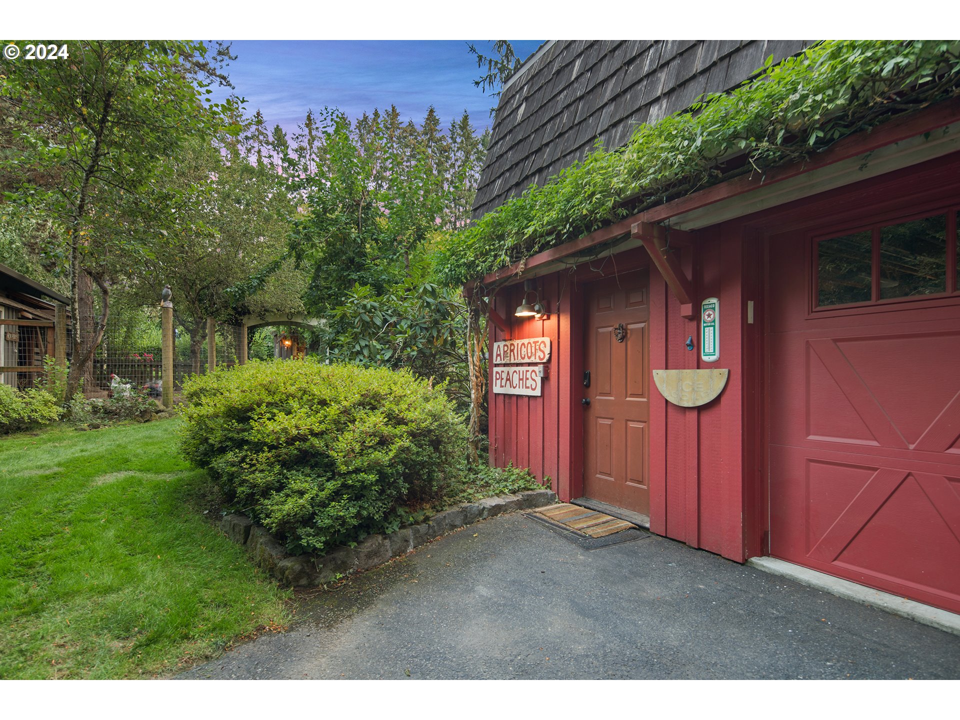 21545 Southwest Johnson Road West Linn, OR 97068 - Photo 39 of 43 a couple of flower plants in front of door