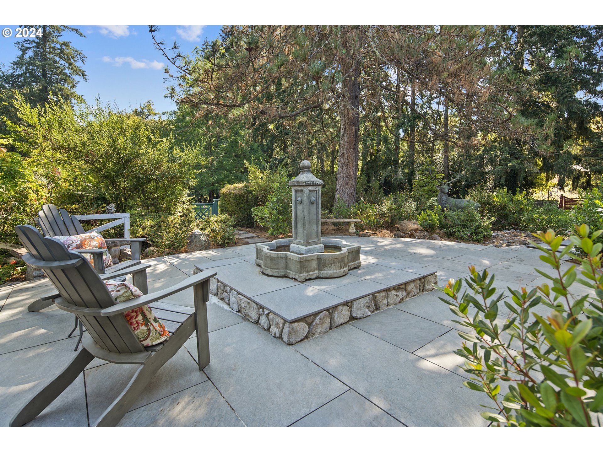 21545 Southwest Johnson Road West Linn, OR 97068 - Photo 40 of 43 a view of a bench in a backyard