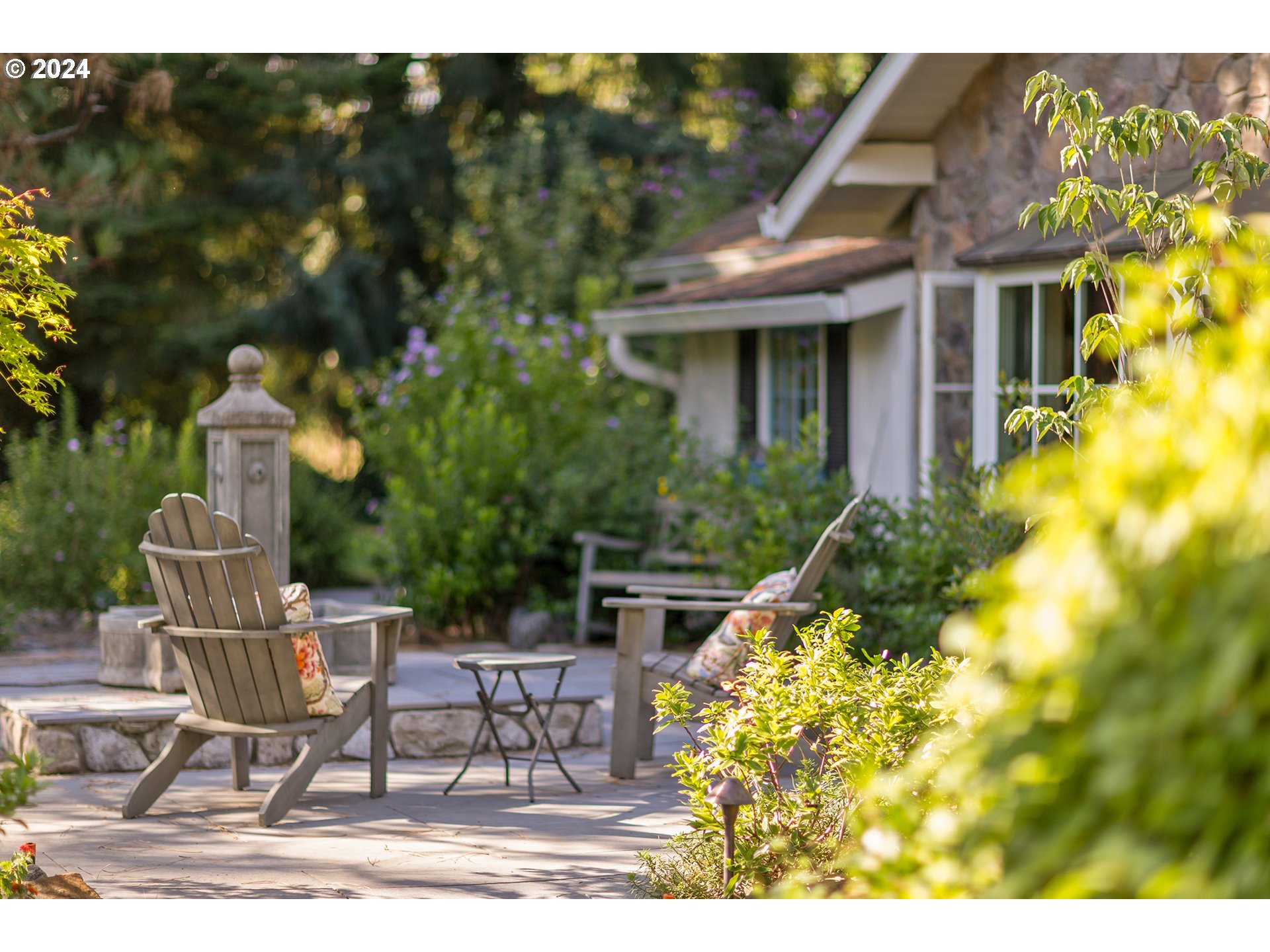 21545 Southwest Johnson Road West Linn, OR 97068 - Photo 41 of 43 a view of a patio with table and chairs and potted plants