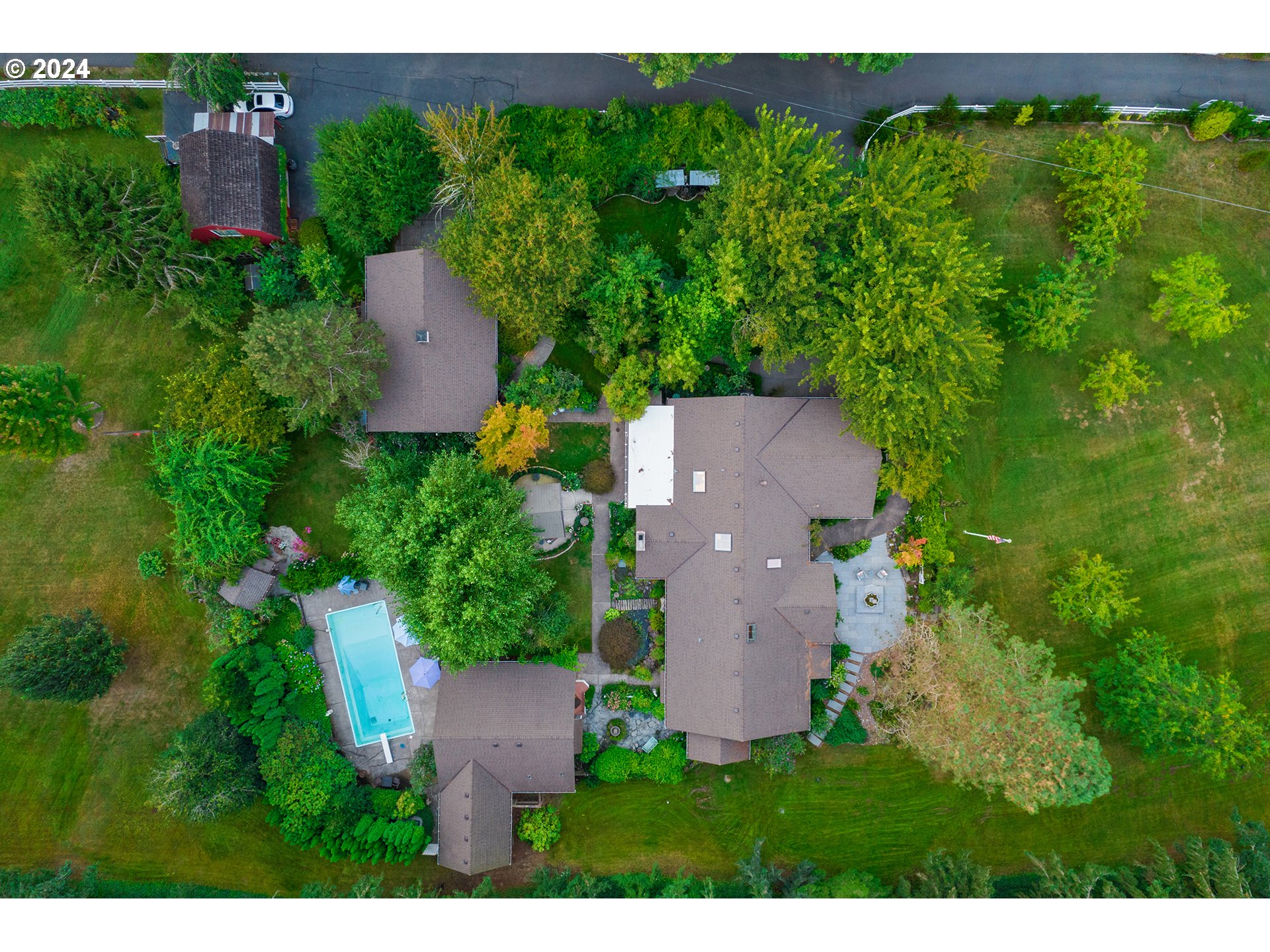 21545 Southwest Johnson Road West Linn, OR 97068 - Photo 43 of 43 an aerial view of a house with a yard and lake view