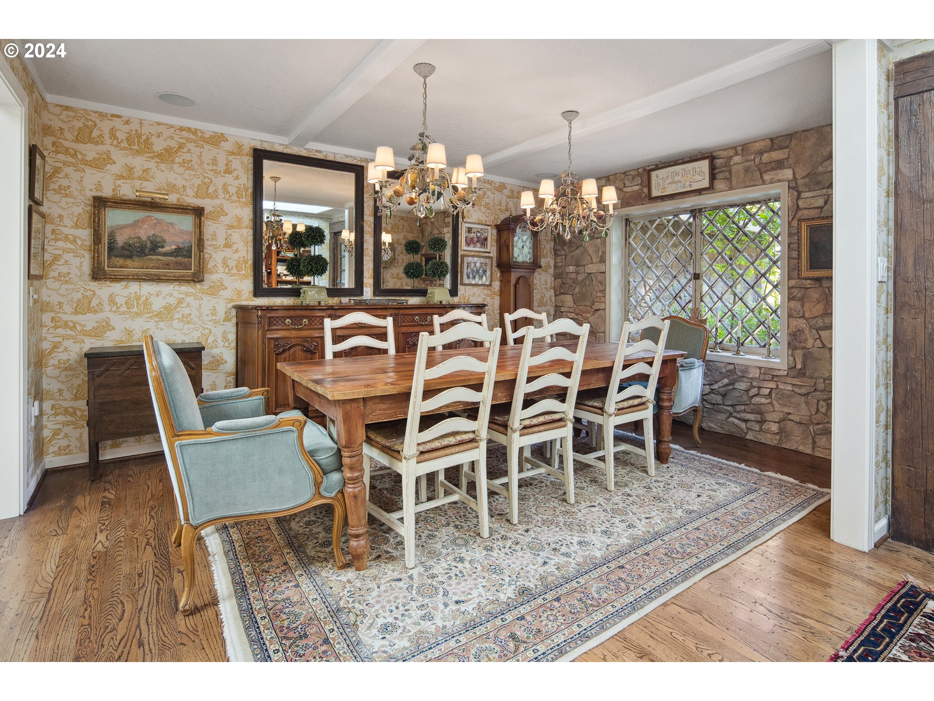 21545 Southwest Johnson Road West Linn, OR 97068 - Photo 5 of 43 a view of a dining room with furniture wooden floor and chandelier