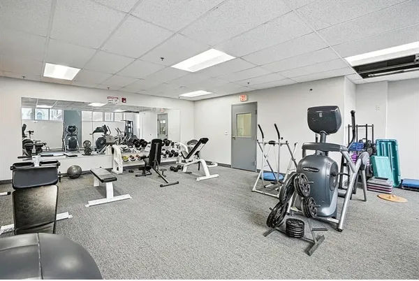 a view of a room with gym equipment