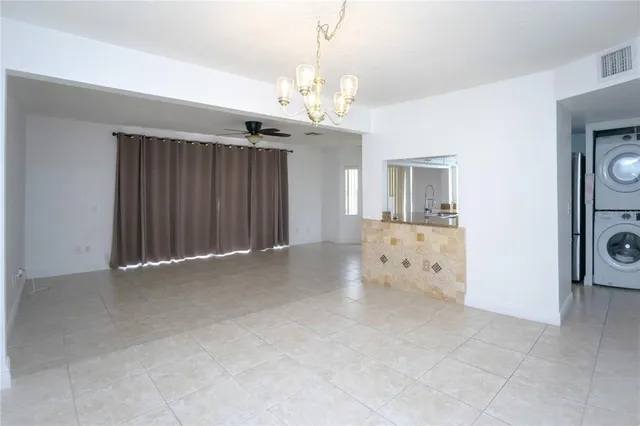 a view of an empty room with a bathroom