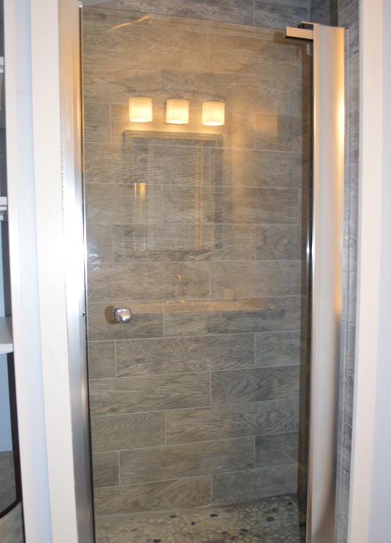 10 Falls Road Norton, MA 02766 - Photo 7 of 17 a bathroom with a bathtub