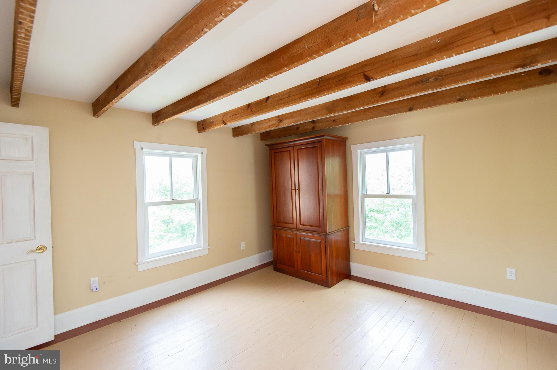 10494 Rich Neck Road Claiborne, MD 21624 - Photo 43 of 80 Second Bedroom with original beams