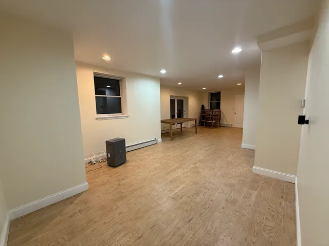 a view of kitchen with furniture and window