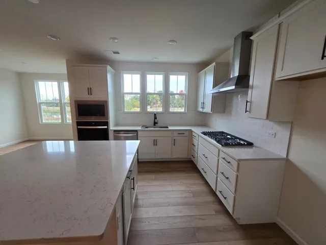 a view of a golf course with a lake