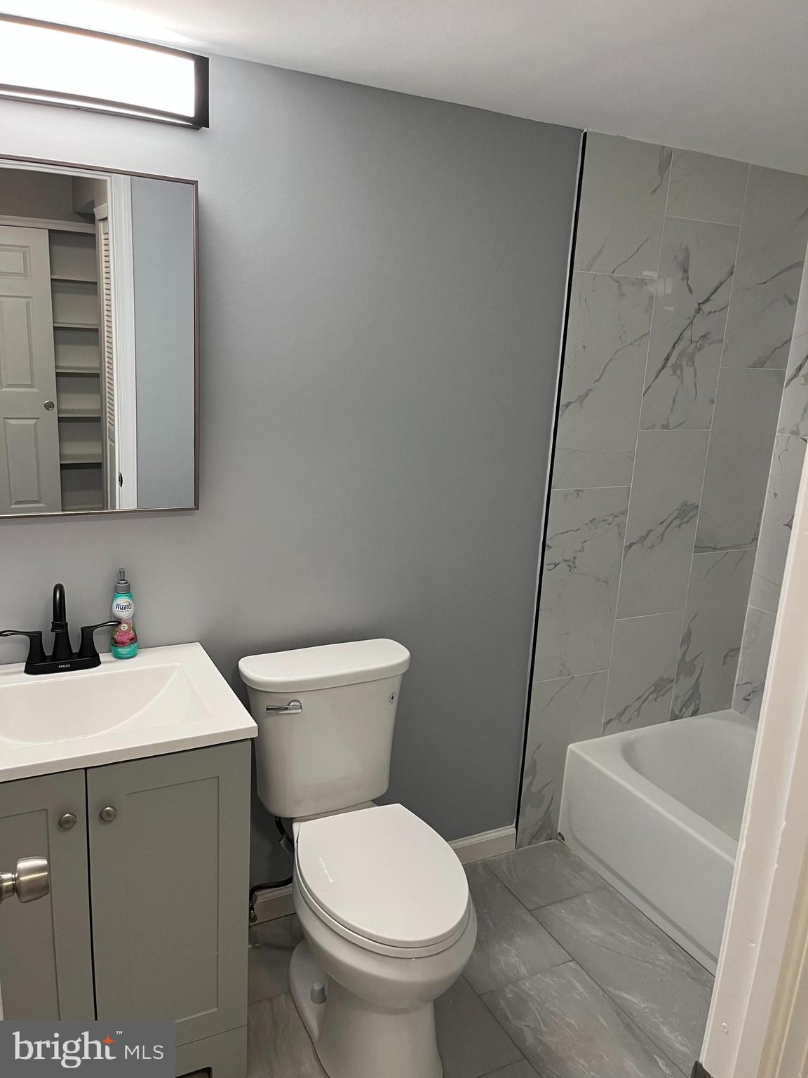 2238 Pileggi Road Warrington, PA 18976 - Photo 2 of 9 a white toilet sitting next to a bathroom sink